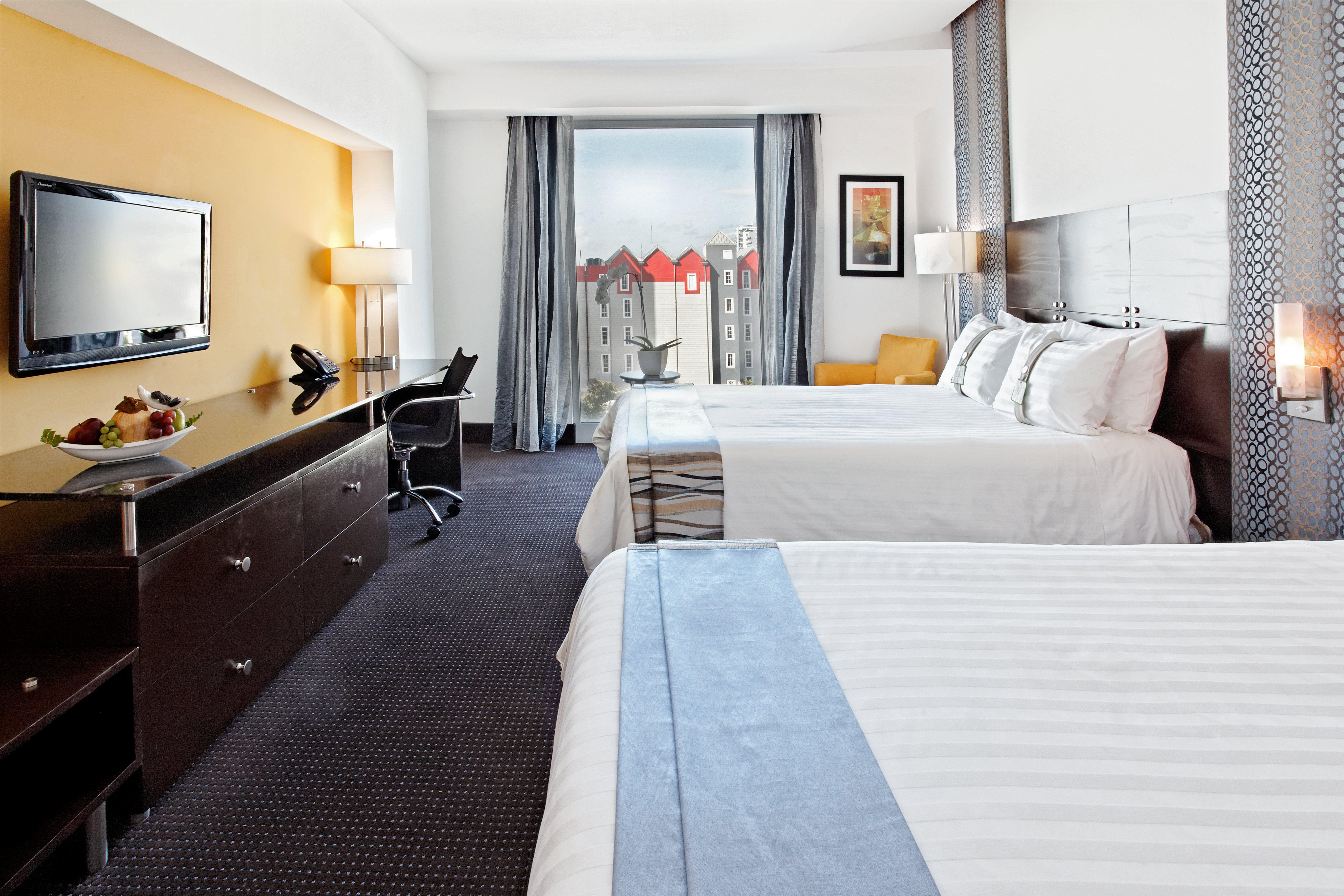 Holiday Inn Santo Domingo By Ihg Extérieur photo A typical room at the hotel